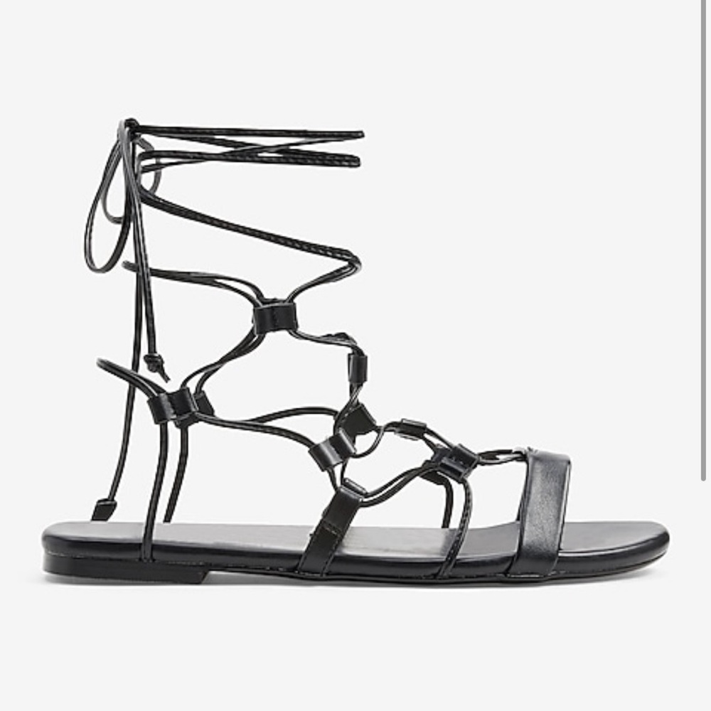 Express tie up gladiator sandals. NWT. Size 6. Black